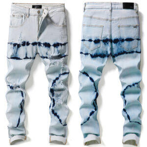 AMIRI RIPPED SKINNY JEANS